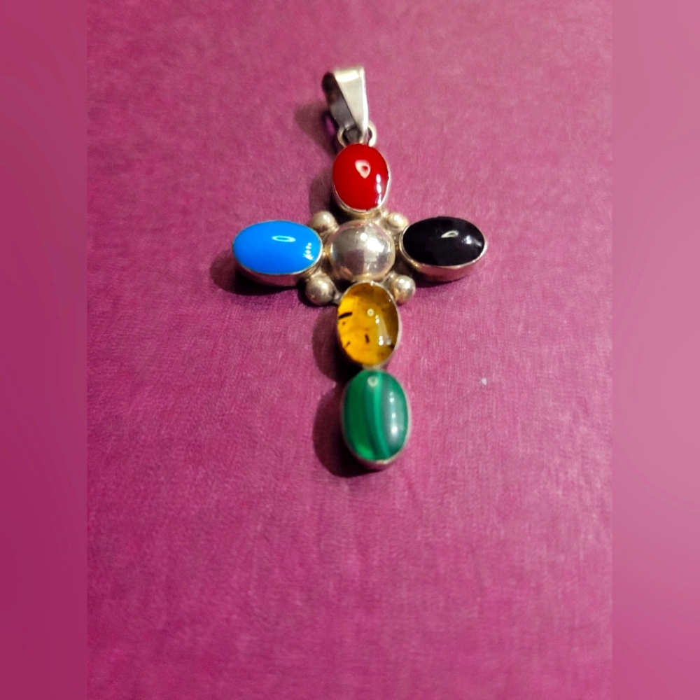 STERLING SILVER PENDANT WITH VARIOUS STONES.